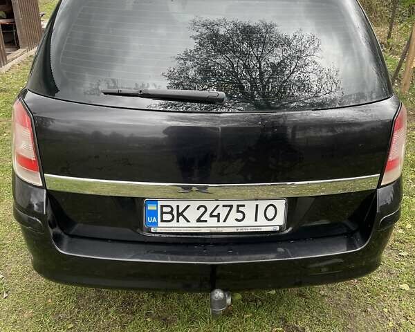 Черный Опель Астра, объемом двигателя 1.6 л и пробегом 272 тыс. км за 5100 $, фото 2 на Automoto.ua