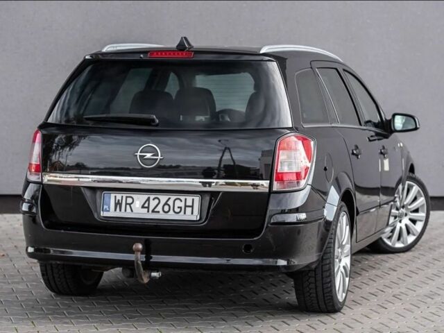 Черный Опель Астра, объемом двигателя 1.9 л и пробегом 300 тыс. км за 2650 $, фото 7 на Automoto.ua