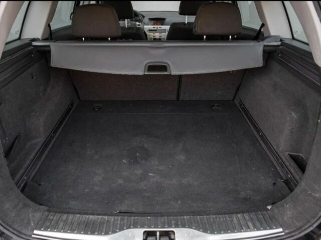 Черный Опель Астра, объемом двигателя 1.9 л и пробегом 300 тыс. км за 2650 $, фото 12 на Automoto.ua