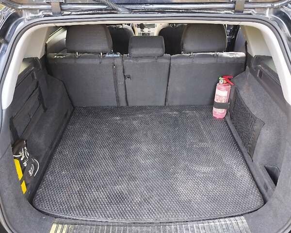 Черный Опель Астра, объемом двигателя 1.6 л и пробегом 228 тыс. км за 5800 $, фото 10 на Automoto.ua