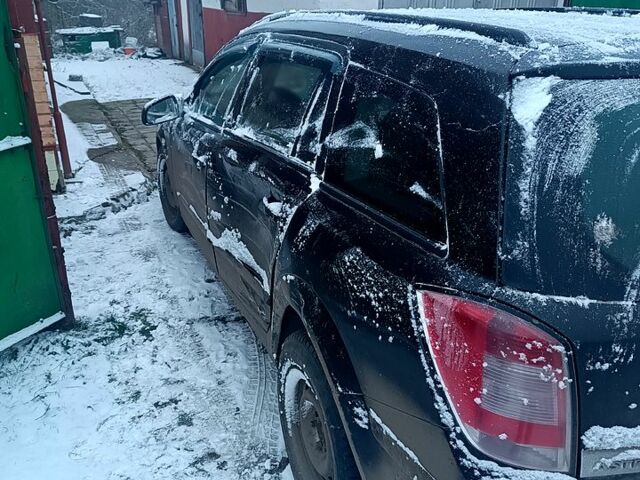 Черный Опель Астра, объемом двигателя 1.2 л и пробегом 292 тыс. км за 3000 $, фото 2 на Automoto.ua