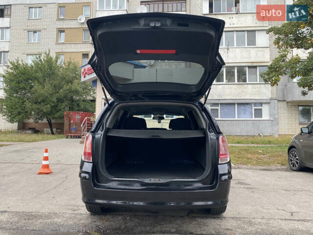 Черный Опель Астра, объемом двигателя 1.6 л и пробегом 231 тыс. км за 5200 $, фото 6 на Automoto.ua
