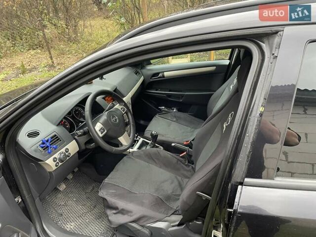 Черный Опель Астра, объемом двигателя 1.6 л и пробегом 272 тыс. км за 5100 $, фото 11 на Automoto.ua