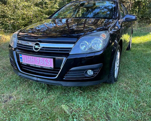 Черный Опель Астра, объемом двигателя 1.6 л и пробегом 228 тыс. км за 4550 $, фото 4 на Automoto.ua