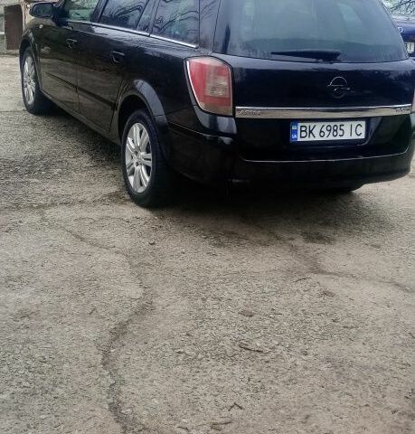Черный Опель Астра, объемом двигателя 1.9 л и пробегом 248 тыс. км за 5100 $, фото 2 на Automoto.ua