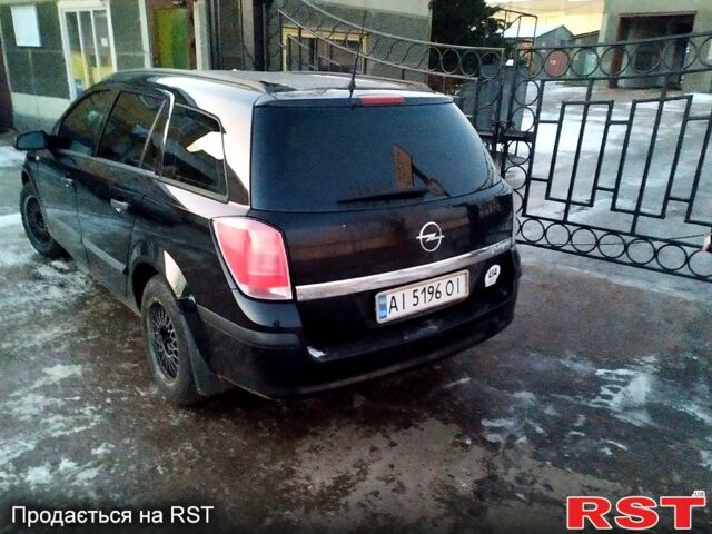 Черный Опель Астра, объемом двигателя 16 л и пробегом 203 тыс. км за 4350 $, фото 2 на Automoto.ua