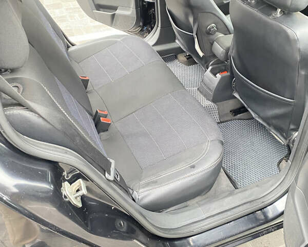 Чорний Опель Астра, об'ємом двигуна 1.25 л та пробігом 202 тис. км за 4500 $, фото 16 на Automoto.ua