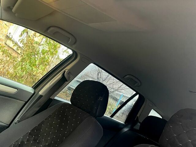 Черный Опель Астра, объемом двигателя 1.6 л и пробегом 245 тыс. км за 5400 $, фото 7 на Automoto.ua