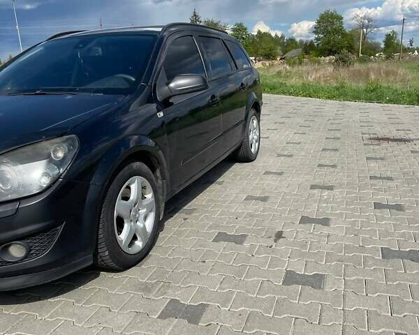 Черный Опель Астра, объемом двигателя 1.91 л и пробегом 242 тыс. км за 4500 $, фото 3 на Automoto.ua