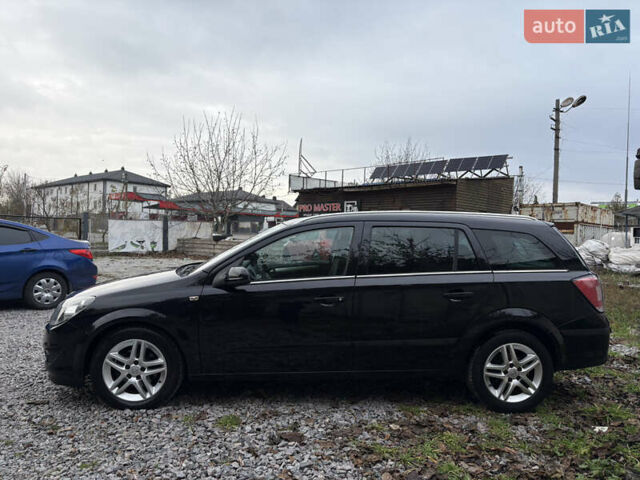 Черный Опель Астра, объемом двигателя 1.6 л и пробегом 208 тыс. км за 5600 $, фото 13 на Automoto.ua