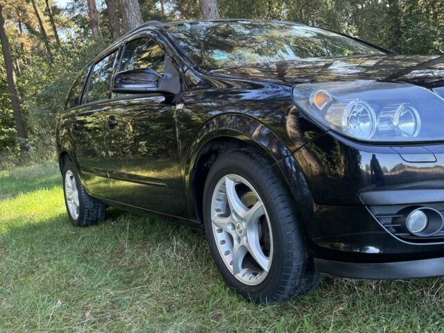 Черный Опель Астра, объемом двигателя 1.6 л и пробегом 228 тыс. км за 4450 $, фото 5 на Automoto.ua