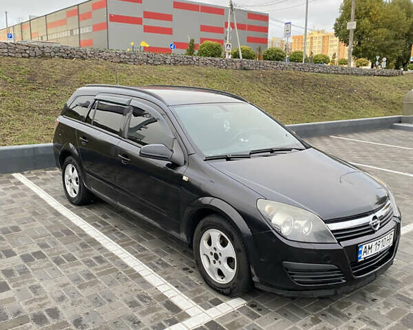 Чорний Опель Астра, об'ємом двигуна 1.25 л та пробігом 202 тис. км за 4500 $, фото 6 на Automoto.ua
