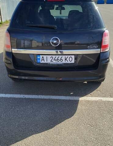 Черный Опель Астра, объемом двигателя 1.6 л и пробегом 319 тыс. км за 4500 $, фото 6 на Automoto.ua