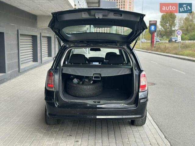 Черный Опель Астра, объемом двигателя 1.6 л и пробегом 216 тыс. км за 5600 $, фото 13 на Automoto.ua