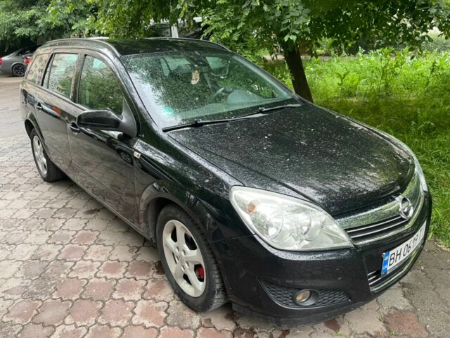 Черный Опель Астра, объемом двигателя 1.6 л и пробегом 264 тыс. км за 5000 $, фото 1 на Automoto.ua