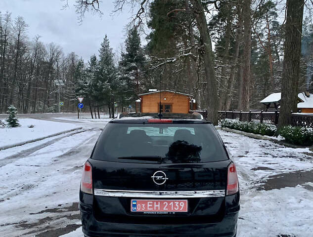 Черный Опель Астра, объемом двигателя 1.6 л и пробегом 226 тыс. км за 5100 $, фото 6 на Automoto.ua