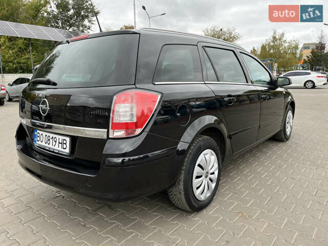 Черный Опель Астра, объемом двигателя 1.6 л и пробегом 223 тыс. км за 5750 $, фото 19 на Automoto.ua
