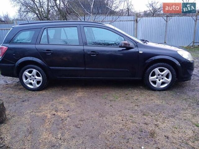 Чорний Опель Астра, об'ємом двигуна 1.69 л та пробігом 220 тис. км за 4999 $, фото 1 на Automoto.ua