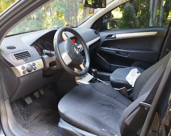 Черный Опель Астра, объемом двигателя 1.6 л и пробегом 228 тыс. км за 5800 $, фото 3 на Automoto.ua