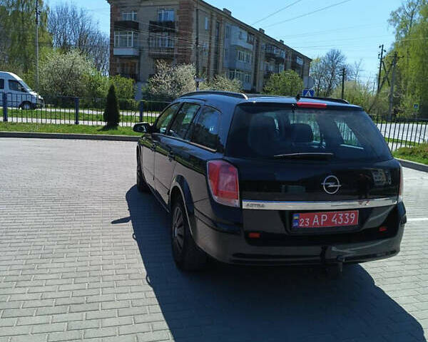 Черный Опель Астра, объемом двигателя 1.6 л и пробегом 230 тыс. км за 4999 $, фото 8 на Automoto.ua