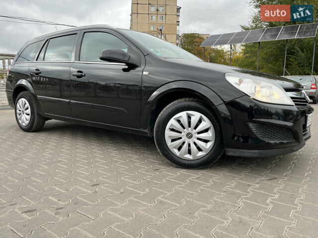 Черный Опель Астра, объемом двигателя 1.6 л и пробегом 223 тыс. км за 5750 $, фото 12 на Automoto.ua