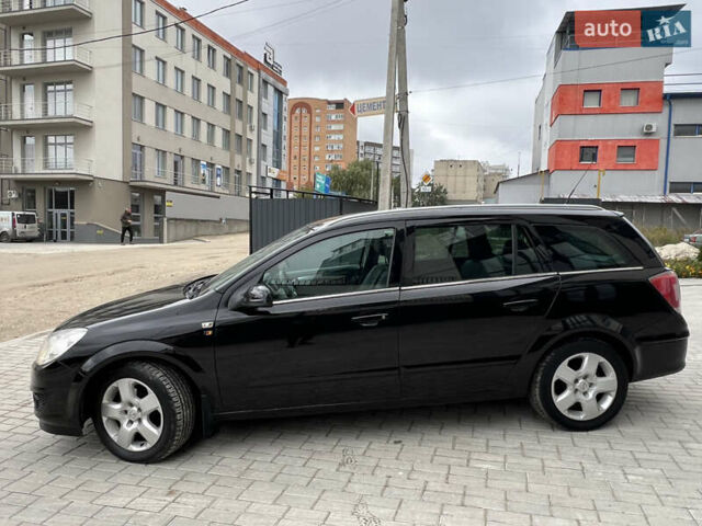 Черный Опель Астра, объемом двигателя 1.6 л и пробегом 250 тыс. км за 4399 $, фото 4 на Automoto.ua