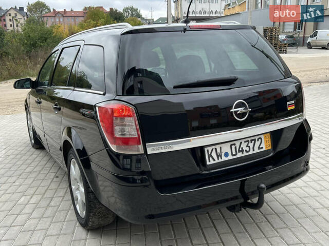 Черный Опель Астра, объемом двигателя 1.6 л и пробегом 250 тыс. км за 4399 $, фото 10 на Automoto.ua