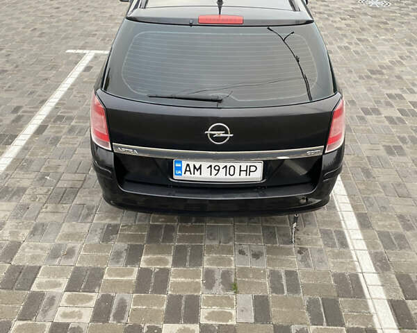 Чорний Опель Астра, об'ємом двигуна 1.25 л та пробігом 202 тис. км за 4500 $, фото 5 на Automoto.ua