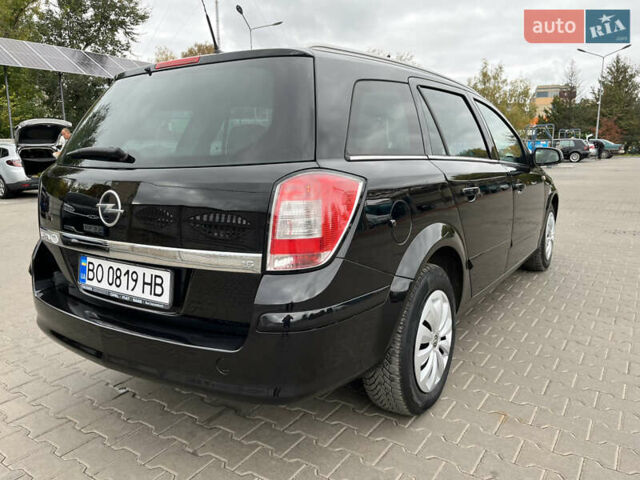 Черный Опель Астра, объемом двигателя 1.6 л и пробегом 223 тыс. км за 5750 $, фото 20 на Automoto.ua