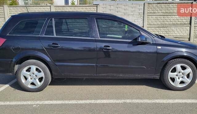 Черный Опель Астра, объемом двигателя 1.6 л и пробегом 319 тыс. км за 4500 $, фото 2 на Automoto.ua