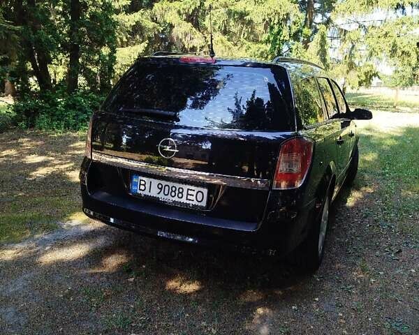 Черный Опель Астра, объемом двигателя 1.6 л и пробегом 228 тыс. км за 5800 $, фото 7 на Automoto.ua