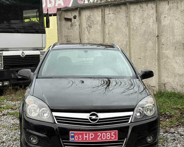 Черный Опель Астра, объемом двигателя 1.6 л и пробегом 208 тыс. км за 5600 $, фото 3 на Automoto.ua