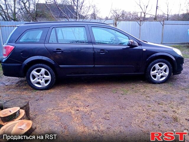 Черный Опель Астра, объемом двигателя 1.7 л и пробегом 220 тыс. км за 4999 $, фото 4 на Automoto.ua