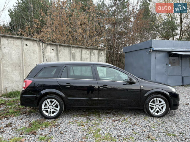 Черный Опель Астра, объемом двигателя 1.6 л и пробегом 208 тыс. км за 5600 $, фото 9 на Automoto.ua