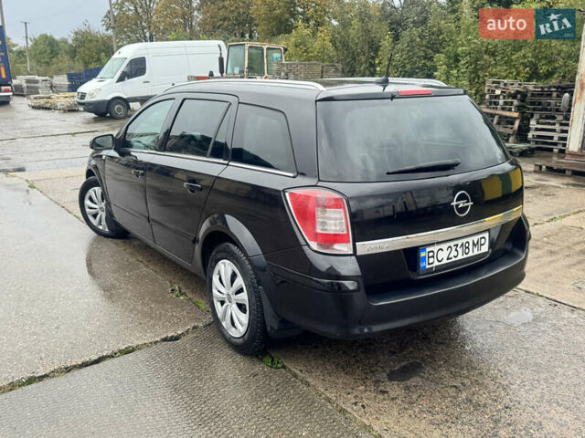 Черный Опель Астра, объемом двигателя 1.69 л и пробегом 300 тыс. км за 4500 $, фото 8 на Automoto.ua