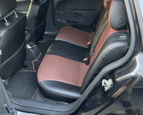 Черный Опель Астра, объемом двигателя 1.6 л и пробегом 190 тыс. км за 5000 $, фото 6 на Automoto.ua
