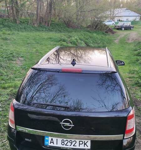 Черный Опель Астра, объемом двигателя 1.6 л и пробегом 235 тыс. км за 5800 $, фото 15 на Automoto.ua