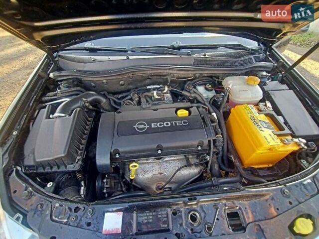 Черный Опель Астра, объемом двигателя 1.6 л и пробегом 290 тыс. км за 6200 $, фото 5 на Automoto.ua