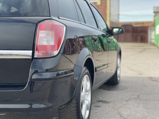 Черный Опель Астра, объемом двигателя 1.6 л и пробегом 239 тыс. км за 5350 $, фото 7 на Automoto.ua