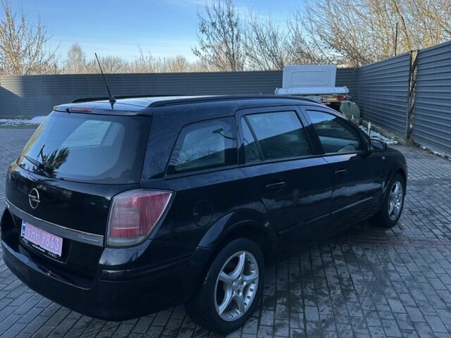 Черный Опель Астра, объемом двигателя 1.6 л и пробегом 228 тыс. км за 4400 $, фото 6 на Automoto.ua