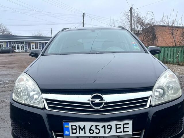 Черный Опель Астра, объемом двигателя 1.6 л и пробегом 245 тыс. км за 5400 $, фото 1 на Automoto.ua