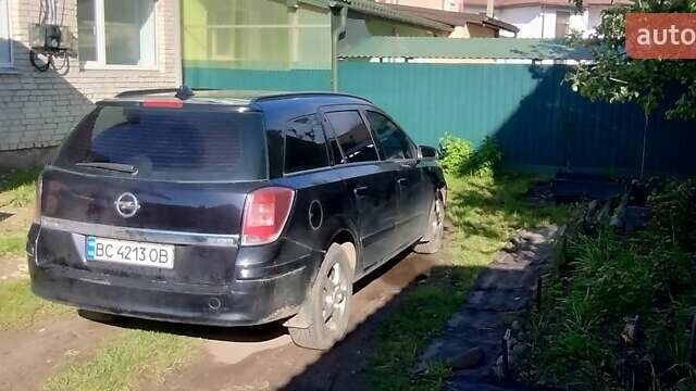 Черный Опель Астра, объемом двигателя 1.91 л и пробегом 260 тыс. км за 5000 $, фото 1 на Automoto.ua