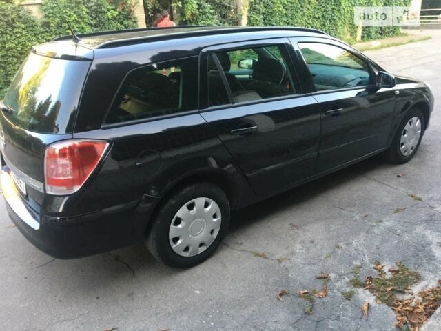 Черный Опель Астра, объемом двигателя 1.6 л и пробегом 227 тыс. км за 5100 $, фото 5 на Automoto.ua
