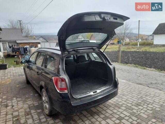 Черный Опель Астра, объемом двигателя 1.7 л и пробегом 237 тыс. км за 5100 $, фото 13 на Automoto.ua