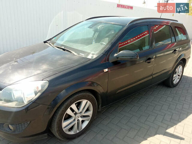 Черный Опель Астра, объемом двигателя 1.6 л и пробегом 250 тыс. км за 5500 $, фото 2 на Automoto.ua