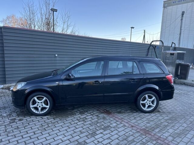 Черный Опель Астра, объемом двигателя 1.6 л и пробегом 228 тыс. км за 4400 $, фото 5 на Automoto.ua