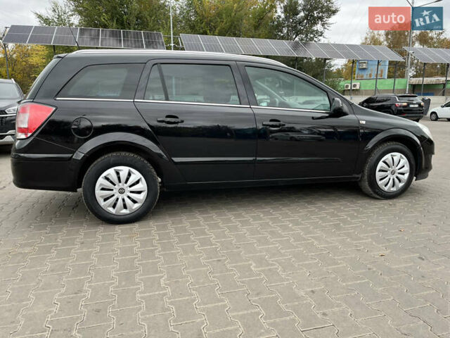 Черный Опель Астра, объемом двигателя 1.6 л и пробегом 223 тыс. км за 5750 $, фото 15 на Automoto.ua