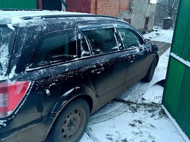 Черный Опель Астра, объемом двигателя 1.2 л и пробегом 292 тыс. км за 3000 $, фото 1 на Automoto.ua
