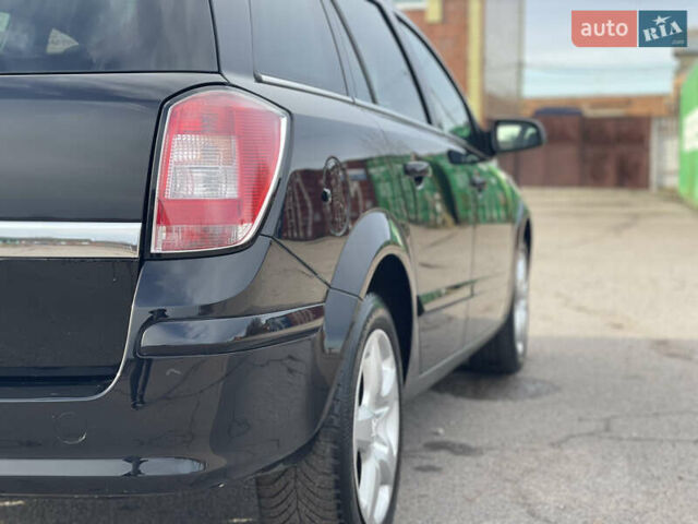 Черный Опель Астра, объемом двигателя 1.6 л и пробегом 239 тыс. км за 5350 $, фото 10 на Automoto.ua