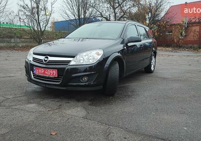 Черный Опель Астра, объемом двигателя 1.82 л и пробегом 204 тыс. км за 5950 $, фото 4 на Automoto.ua